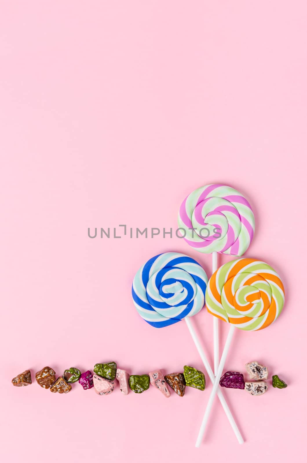 Colorful marshmallow with candy pastel pink background.
