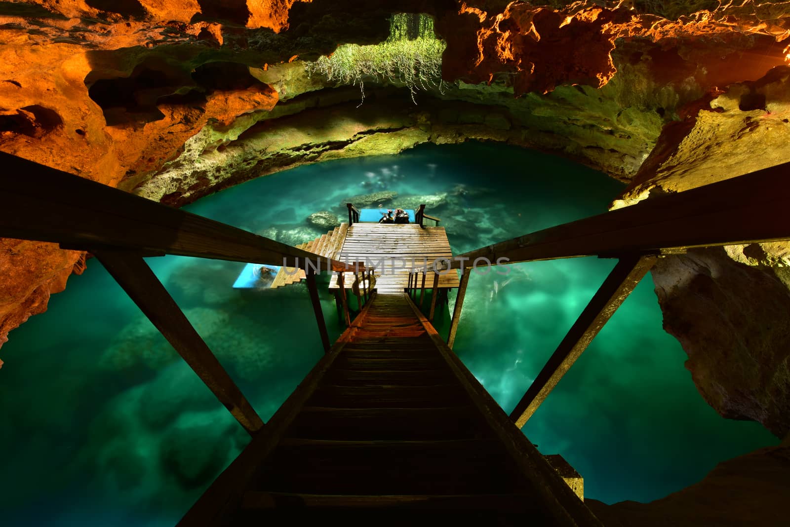 A very large and deep sinkhole containing rainwater in Central Florida, USA