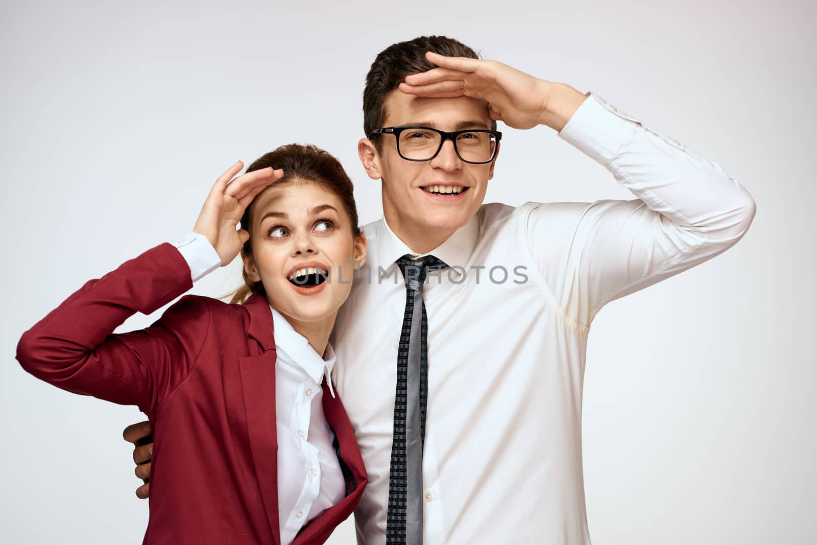 Work colleagues Business couple office officials team studio light background by SHOTPRIME