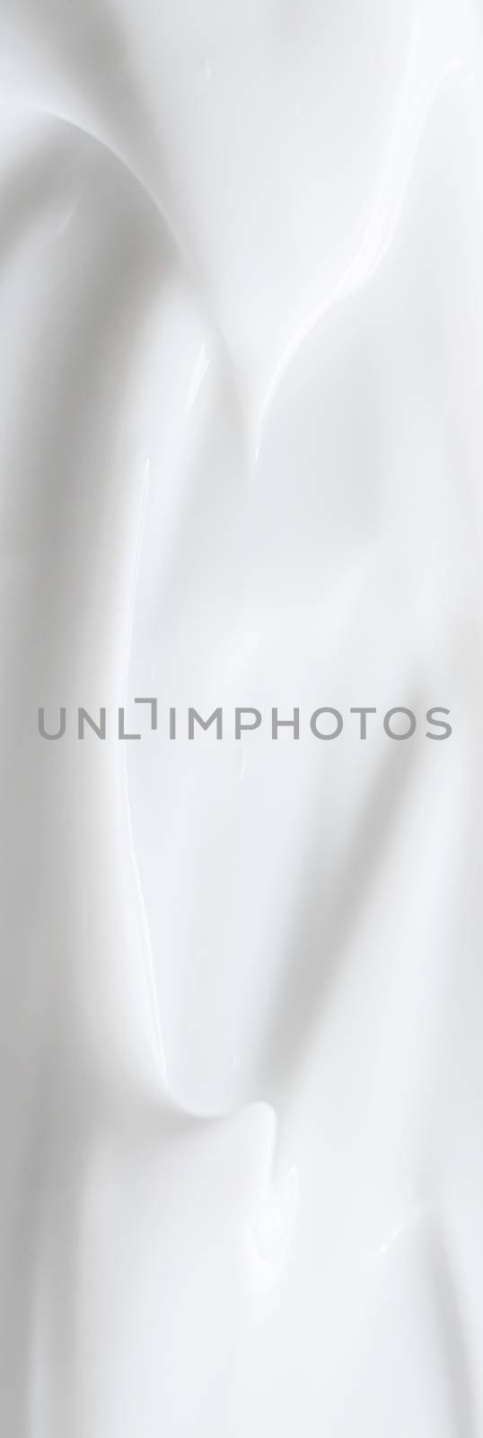 Pure white cream texture as abstract background, food substance or organic cosmetics