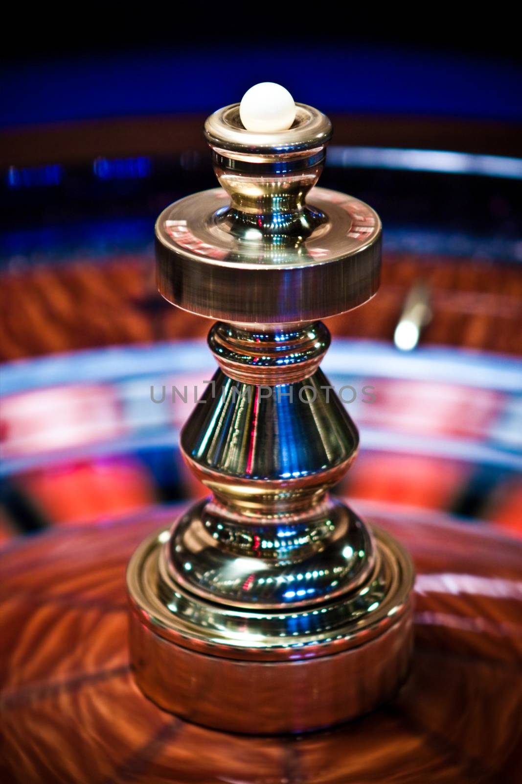 Roulette wheel in casino, gambling ads