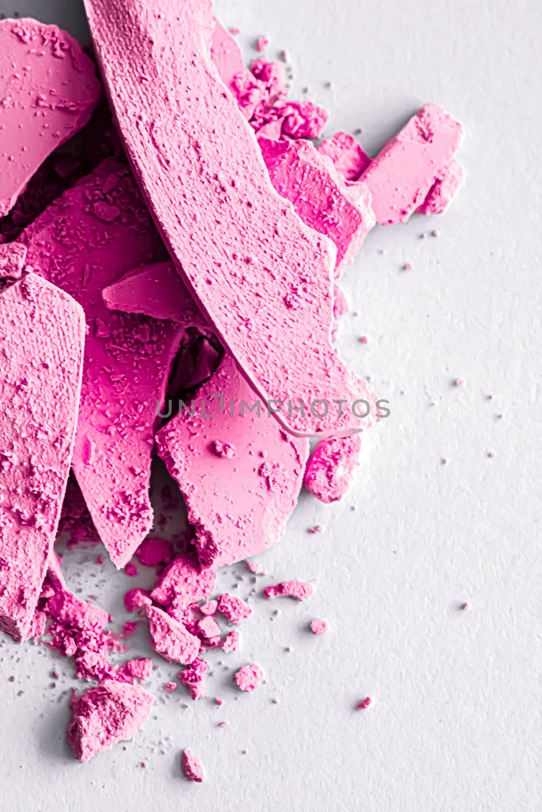 Pink eye shadow powder as makeup palette closeup isolated on white background, crushed cosmetics and beauty texture by Anneleven