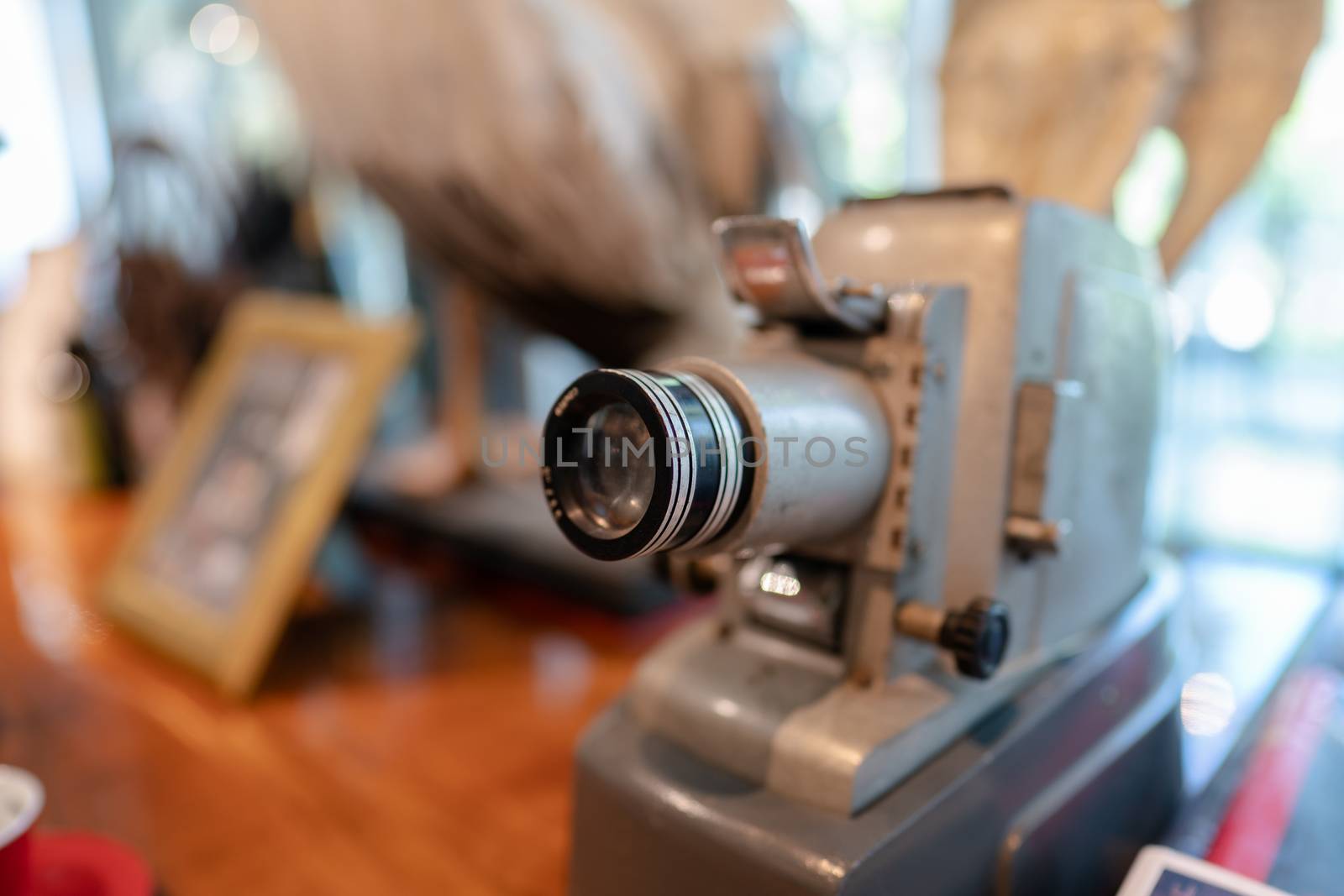 Vintage, antique large format camera in blurred background.