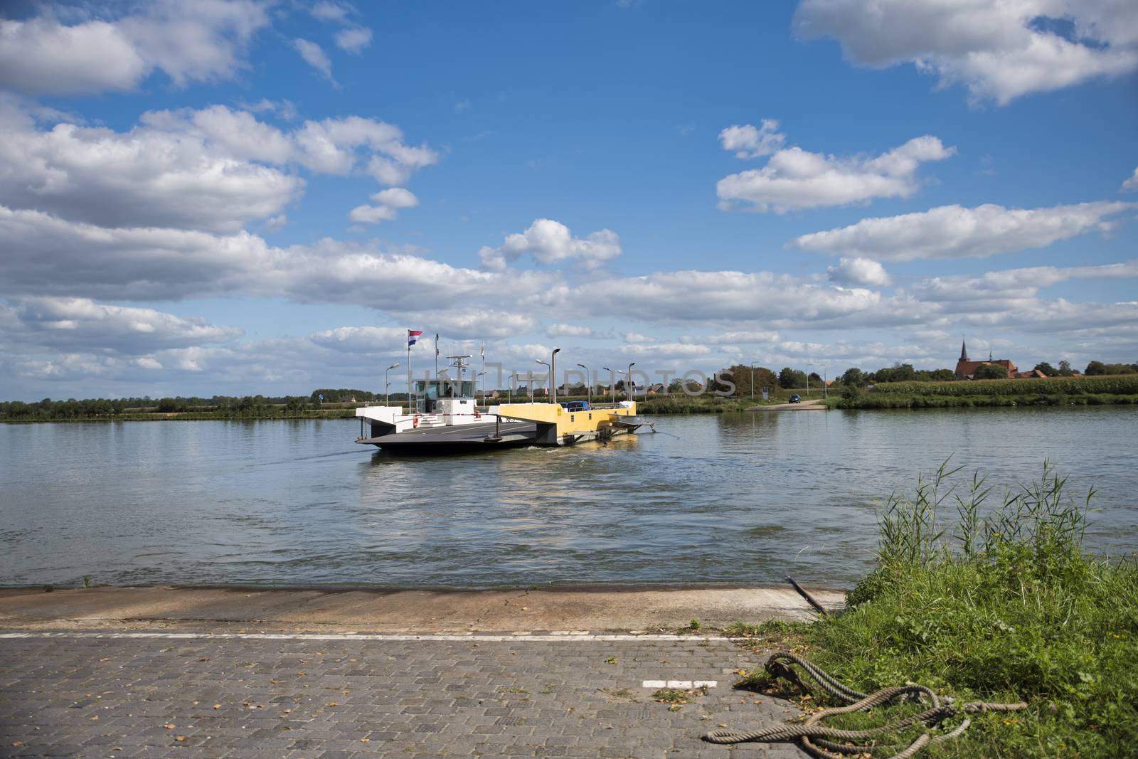 BergenHolland,10-sep-2020:ferry across the river Maas from vlieringsbeek to bergen, it is used by cars and bike to enter the maasduinen nature park