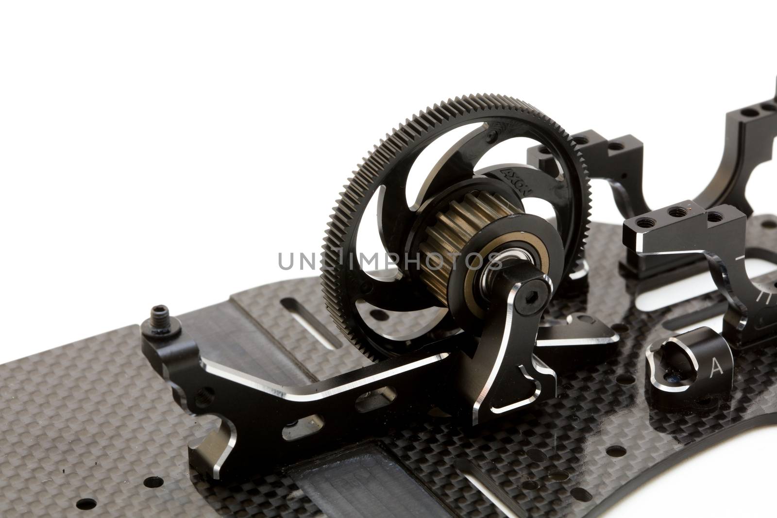 RC car chassis and parts being built to form a radio controlled race car.
