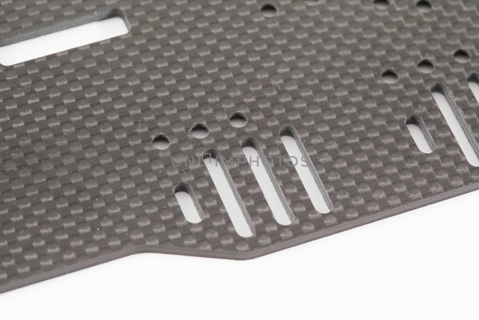 RC car chassis and parts being built to form a radio controlled race car.