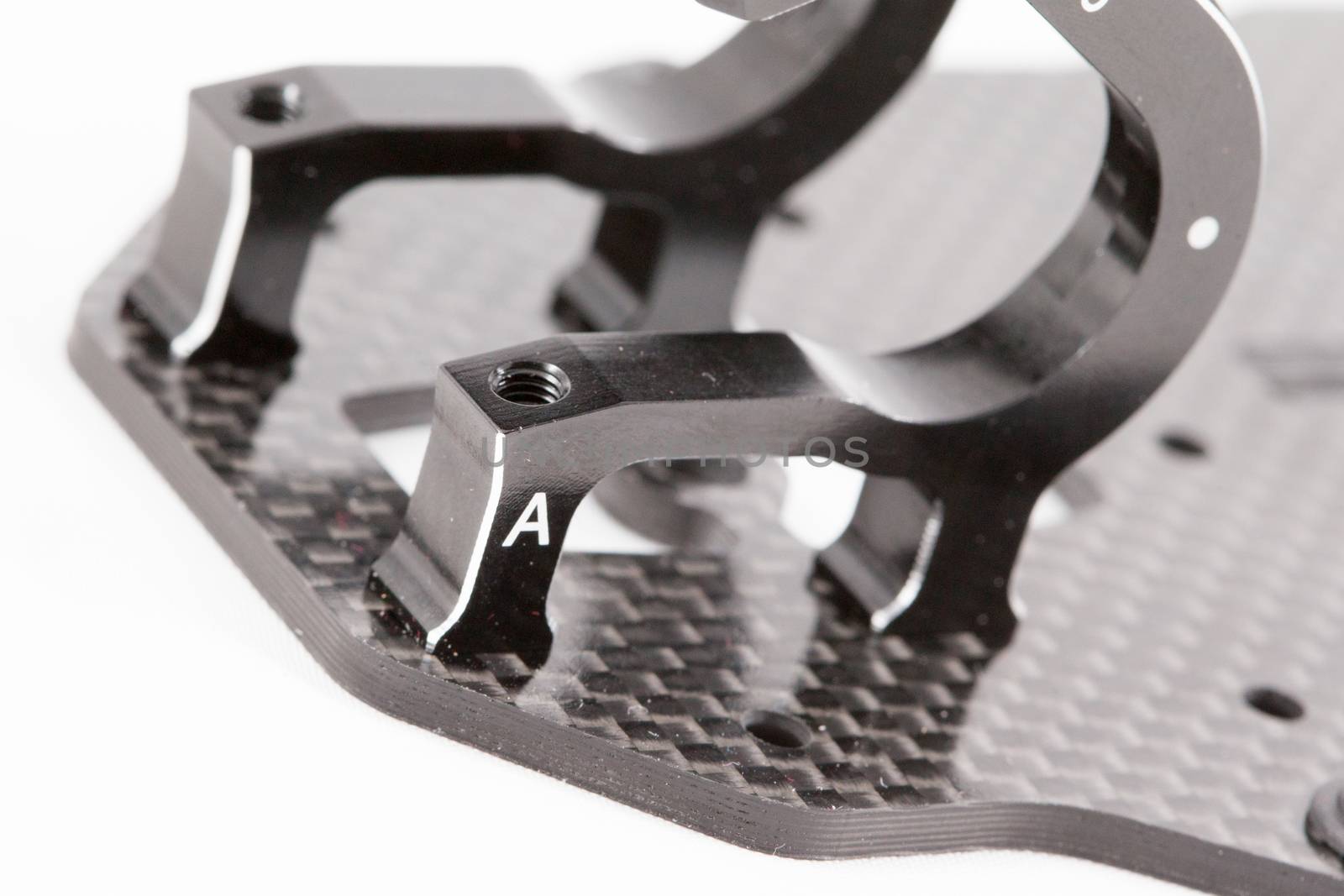 RC car chassis and parts being built to form a radio controlled race car.