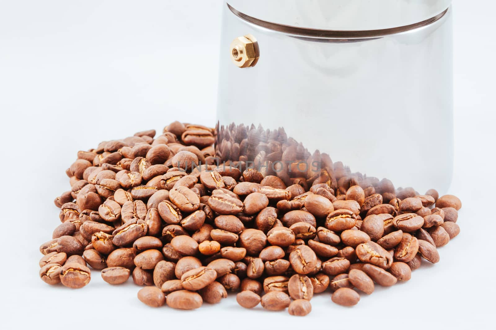 A close up shot of a pile of coffee beans
