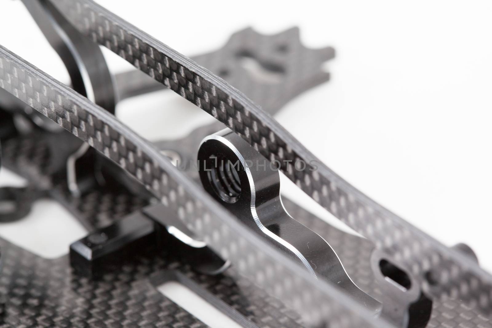 RC car chassis and parts being built to form a radio controlled race car.
