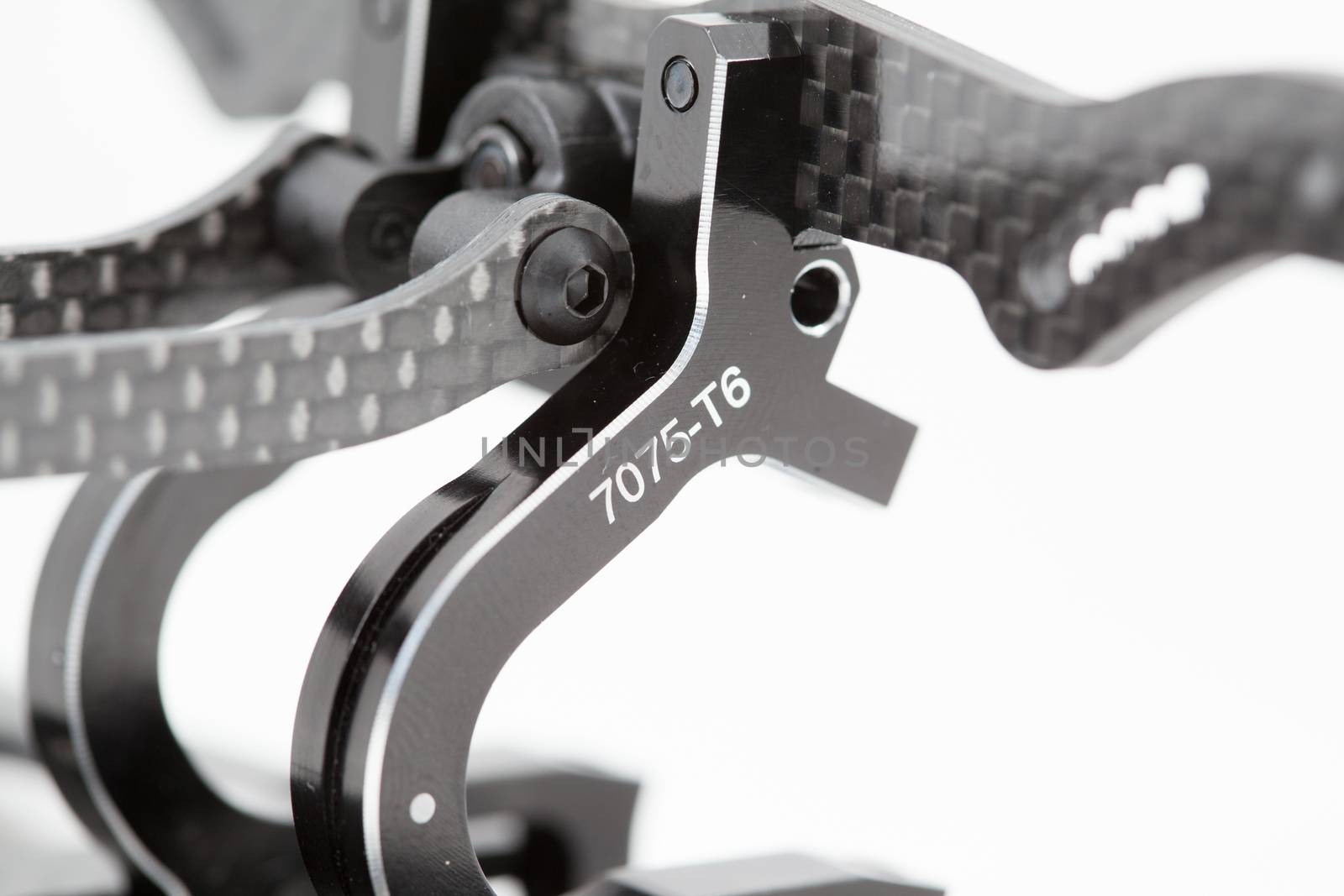 RC car chassis and parts being built to form a radio controlled race car.