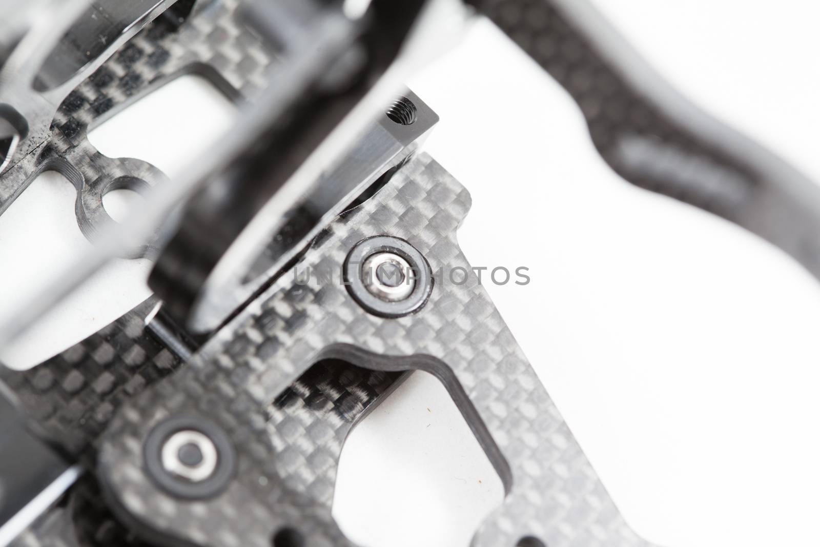 RC car chassis and parts being built to form a radio controlled race car.
