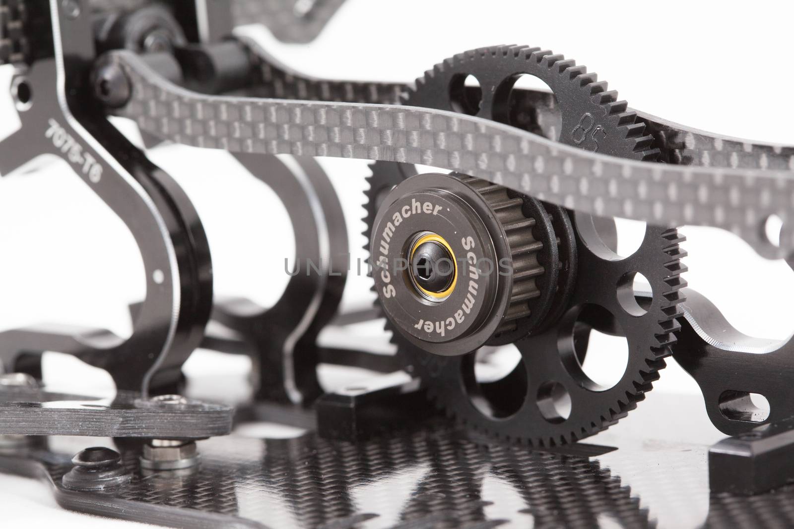 RC car chassis and parts being built to form a radio controlled race car.