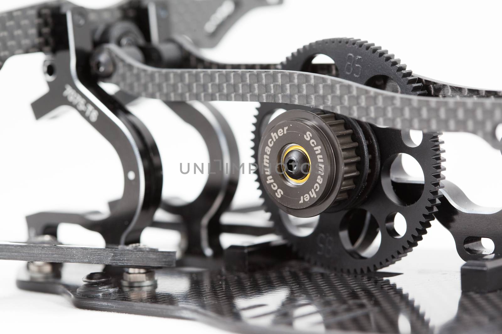 RC car chassis and parts being built to form a radio controlled race car.