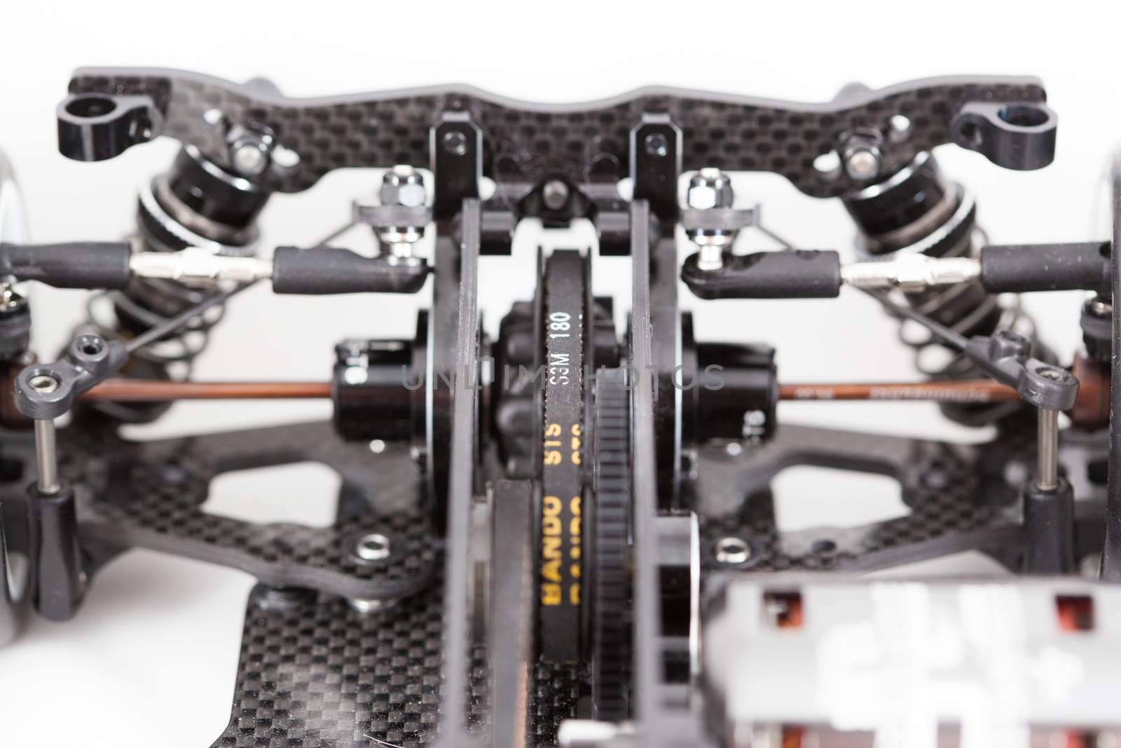 RC car chassis and parts being built to form a radio controlled race car.
