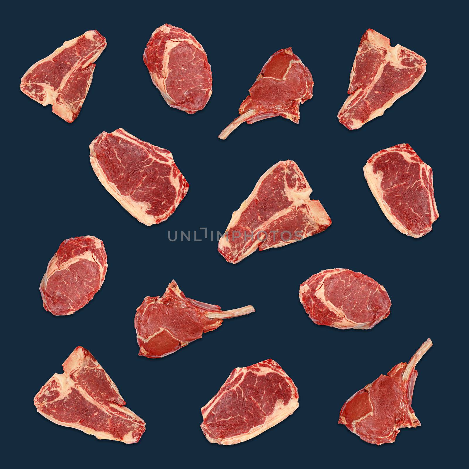 Pattern of different fresh raw beef meat steaks (ribeye, T bone, porterhouse, striploin, tomahawk) over blue background
