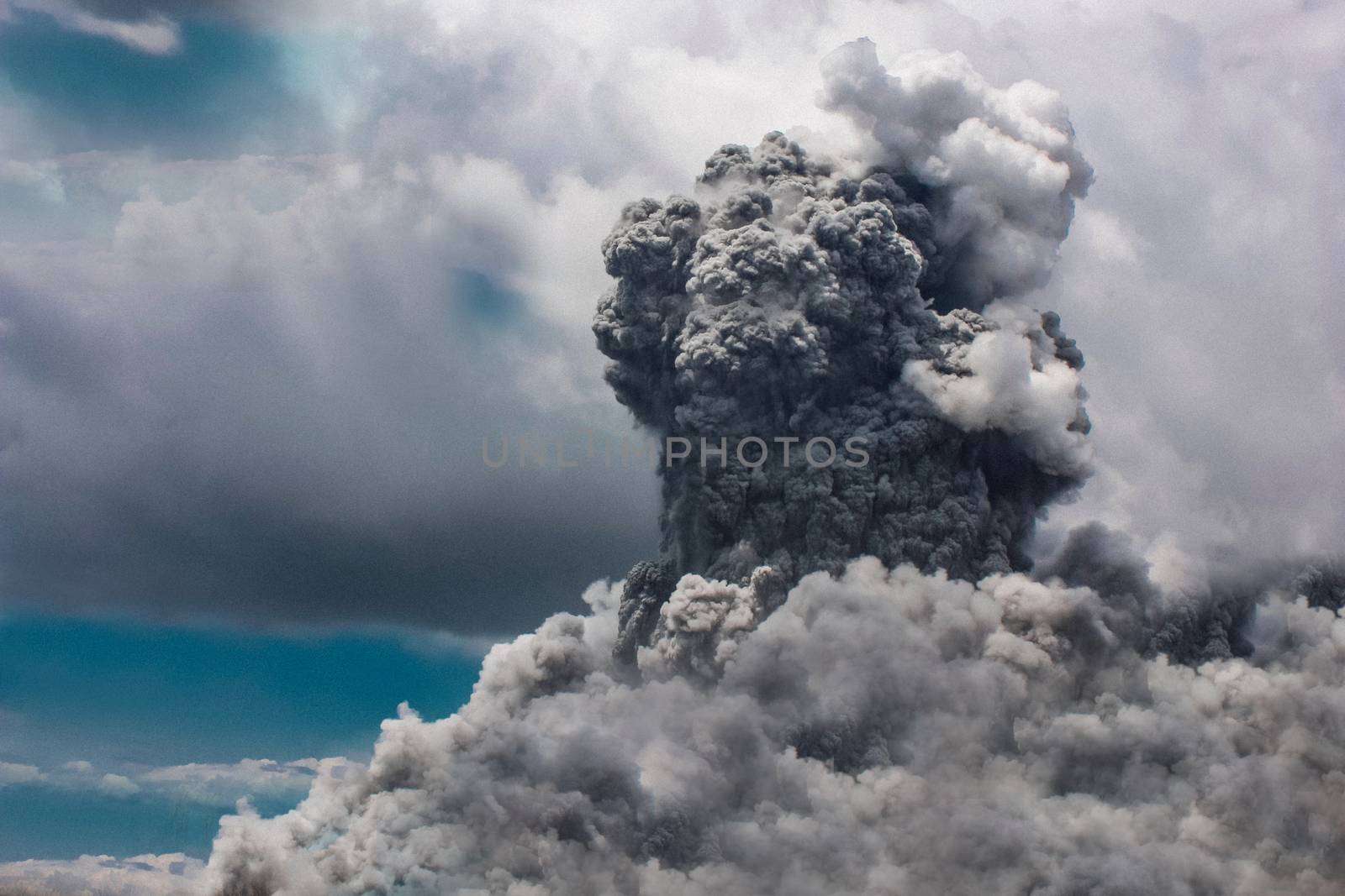 A rising cloud of gray volcano smoke.Texture or background by Mastak80
