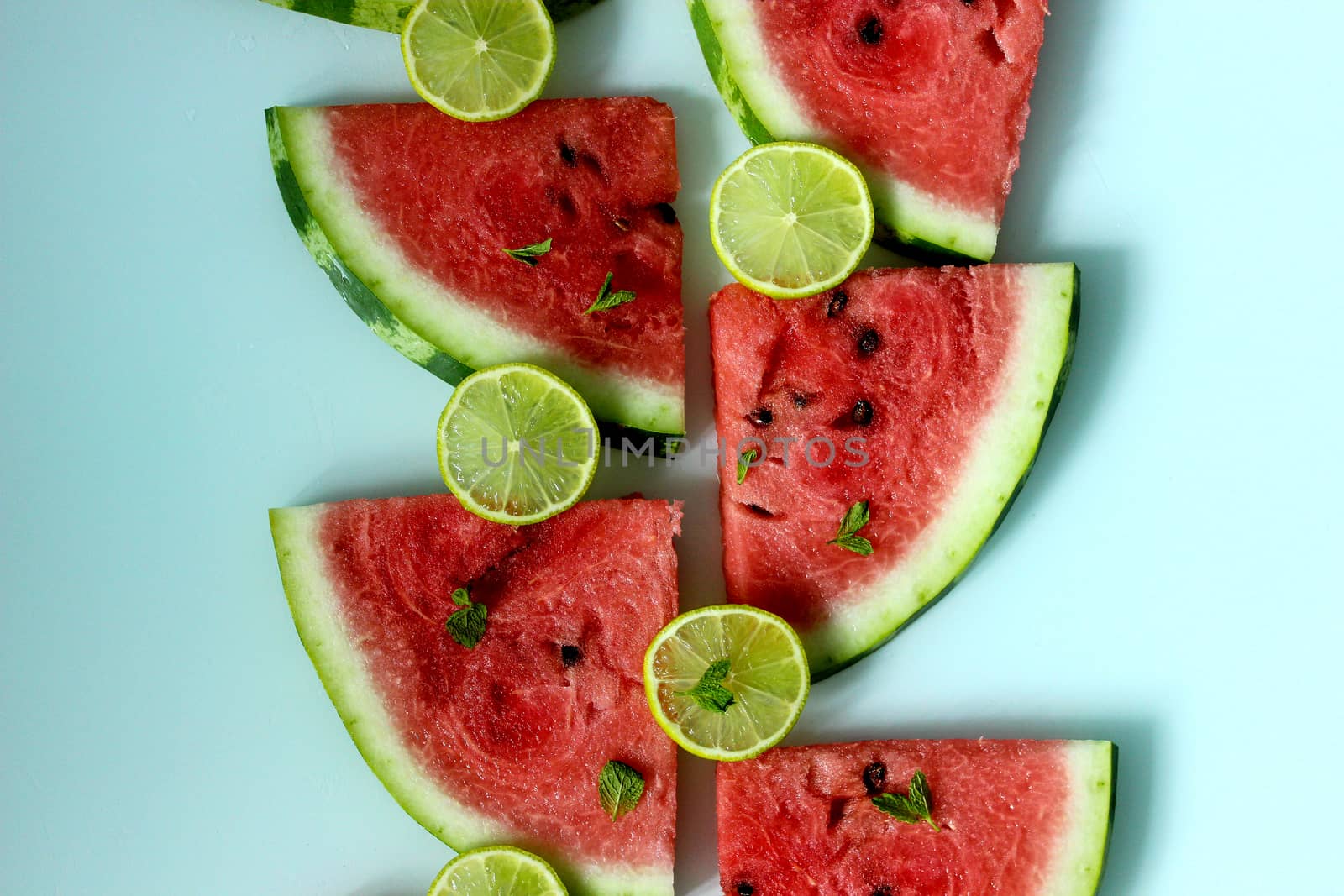 Fresh slices of juicy watermelon with lime by Mastak80