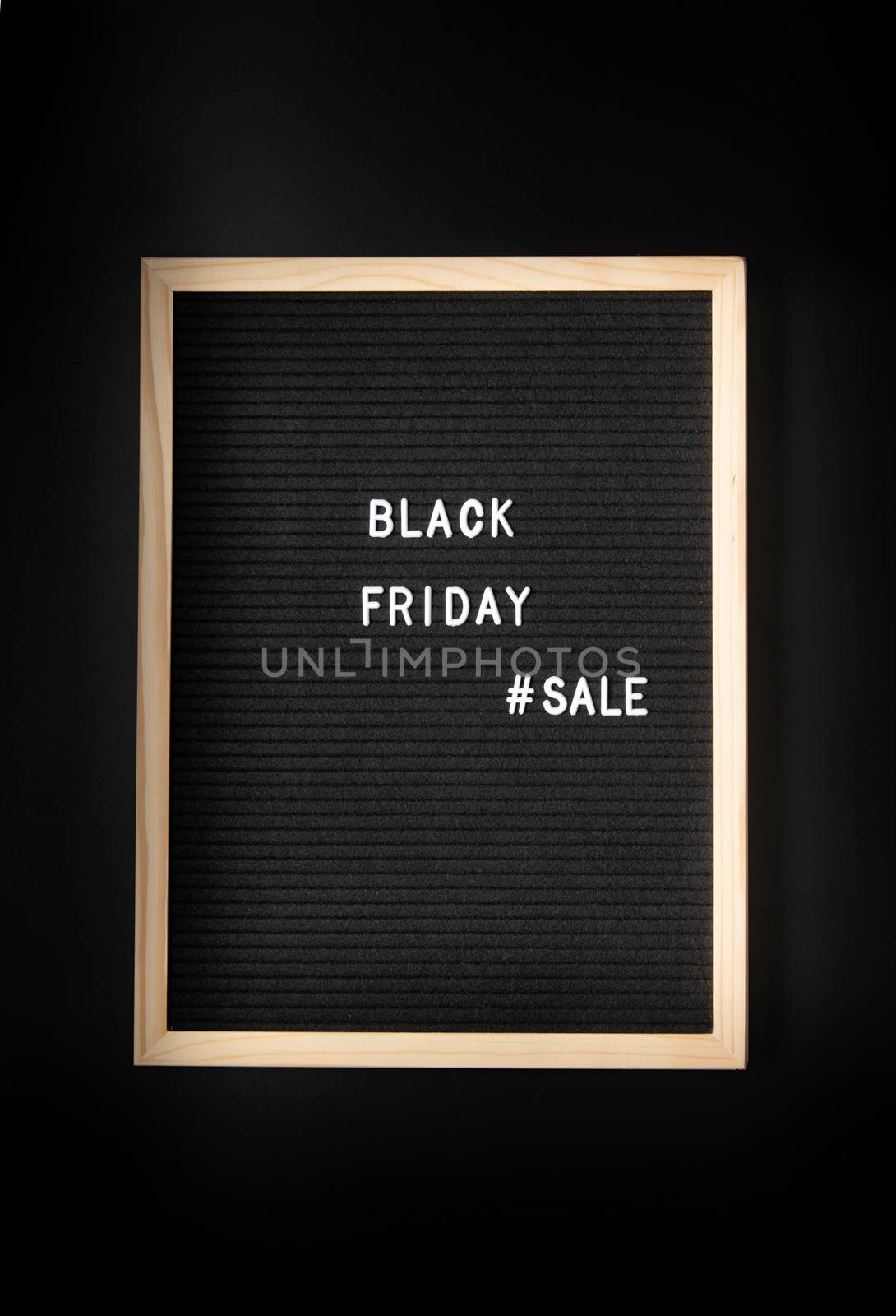 Black friday, seasonal sale concept. Text black friday sale on black letter board on black background