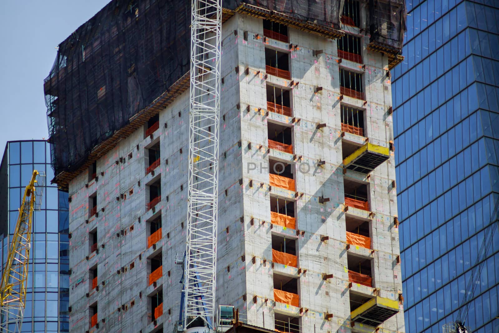 Construction of high rise building tower residential skyscrapers close up
