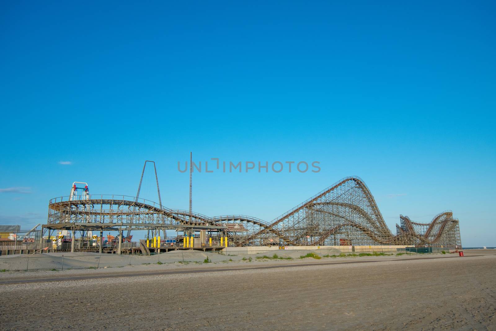 A Wooden Roller Coaster on a Boardwalk in Wildwood New Jersey by bju12290