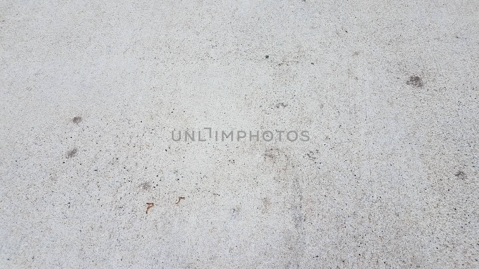 grey rough dirty cement or ground or pavement or concrete