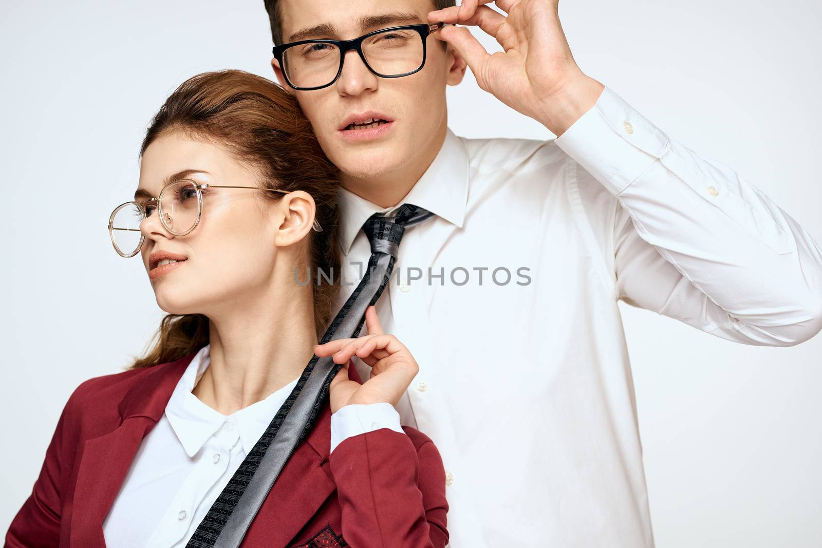 man and woman work colleagues officials communication light background. High quality photo