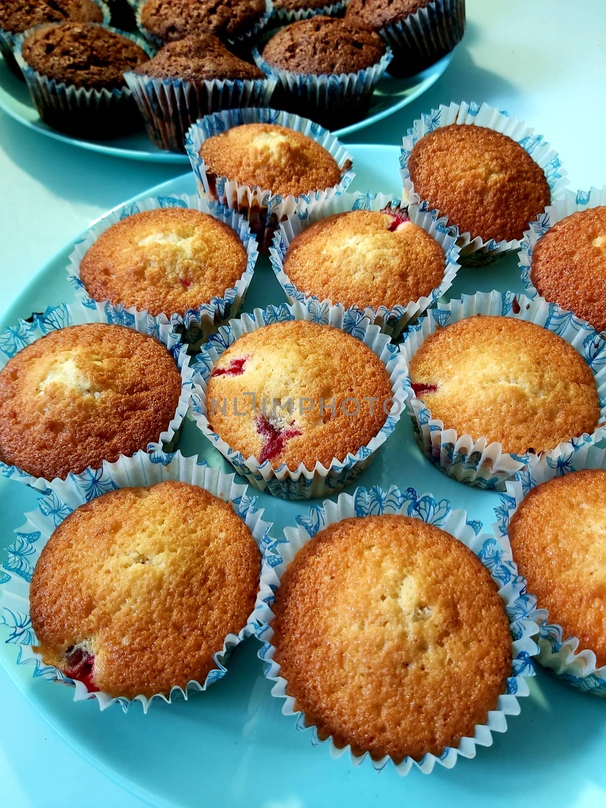 Homemade cakes sweet cupcakes with cream and chocolate flavor