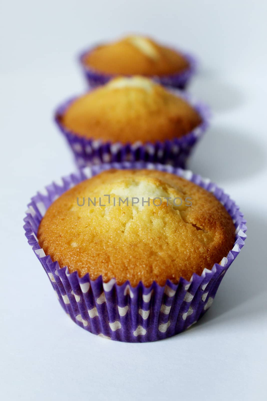 Sweet food three cupcakes for tea .Texture or background