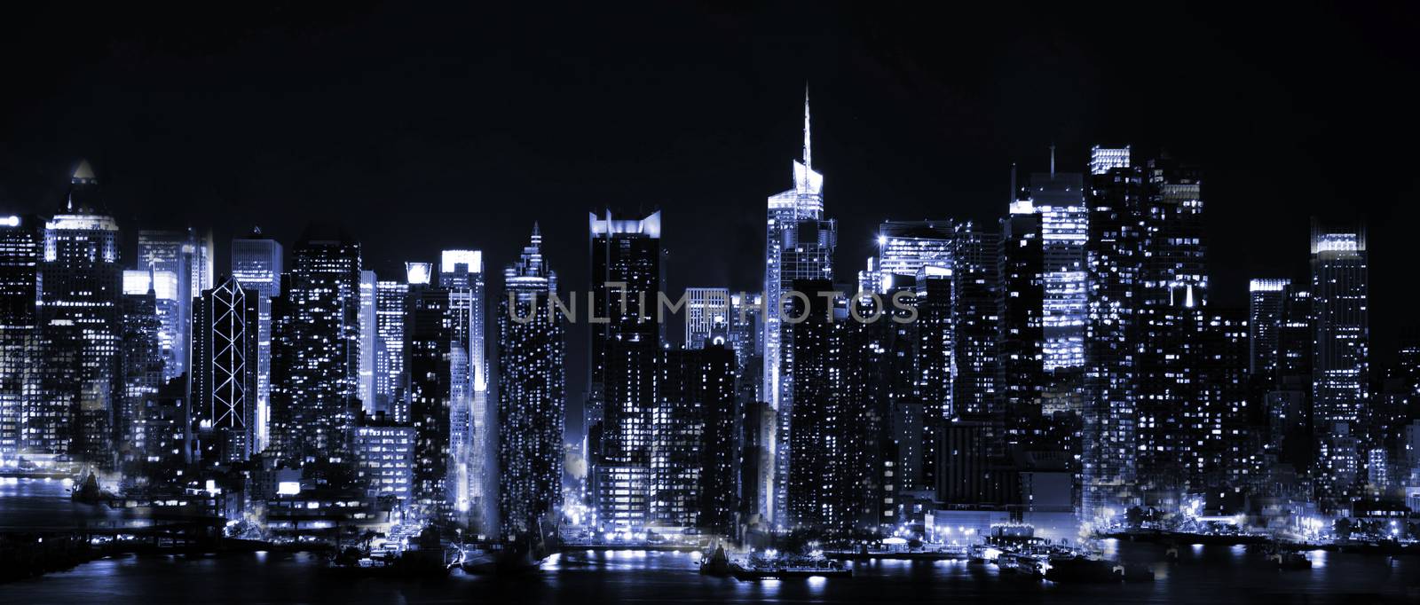 View of a huge night city from afar on a black background.Texture or background