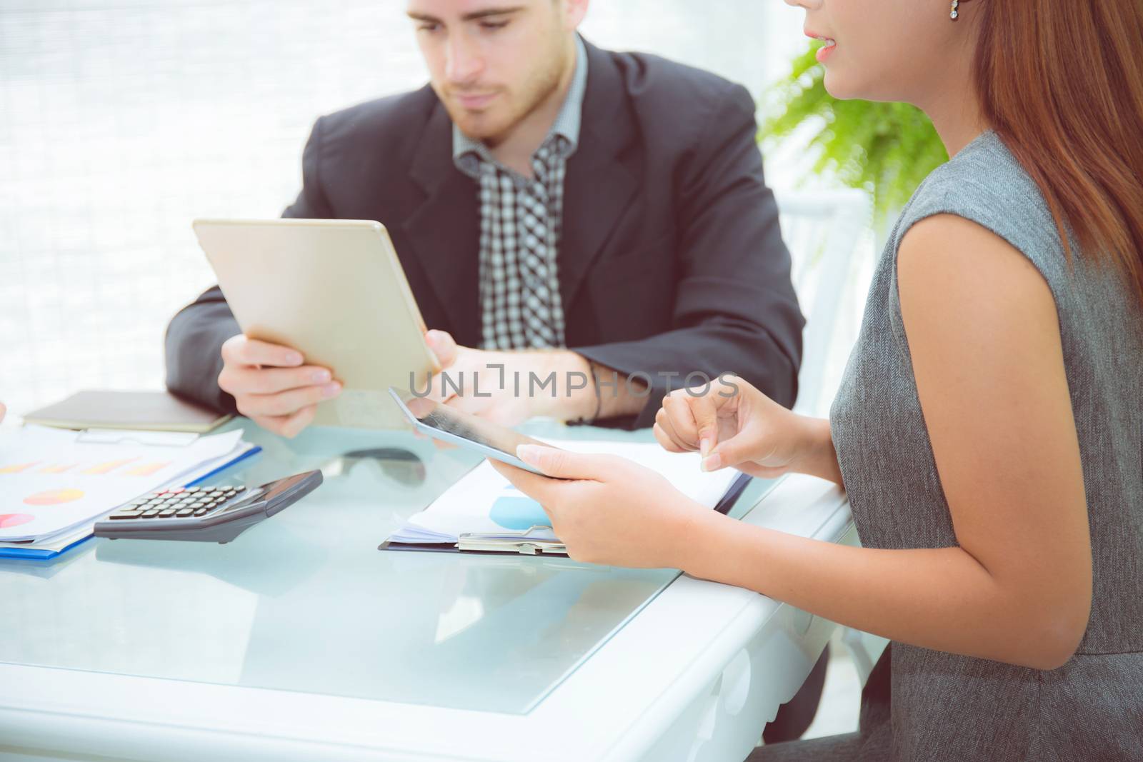 young business people making meeting and talking for analyzing marketing working at office on desk.