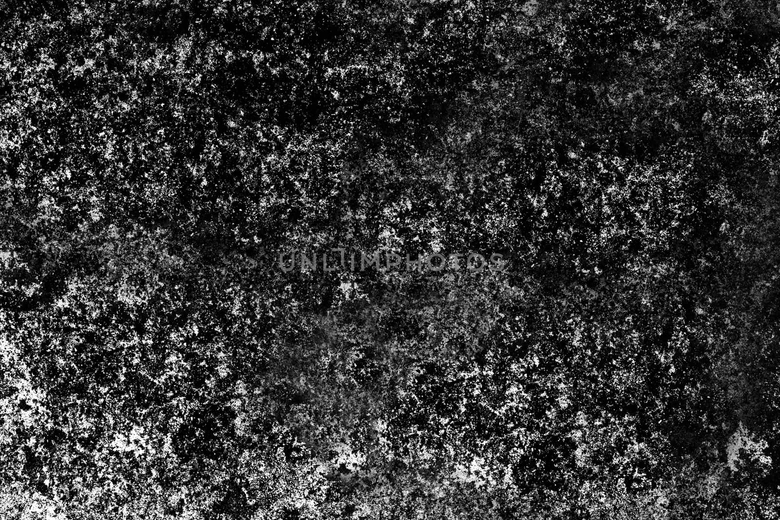 The time-aged textured rough surface of the wall is black and gray . Texture or background.