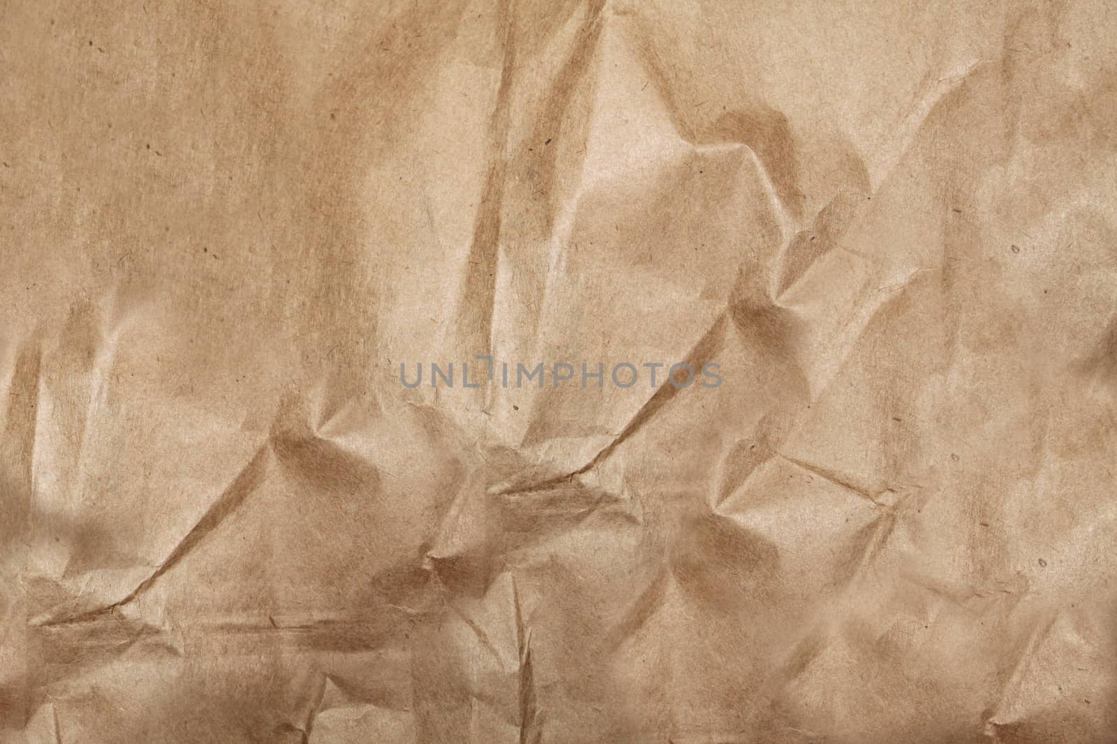 Brown highly crumpled paper package.Texture.Background.