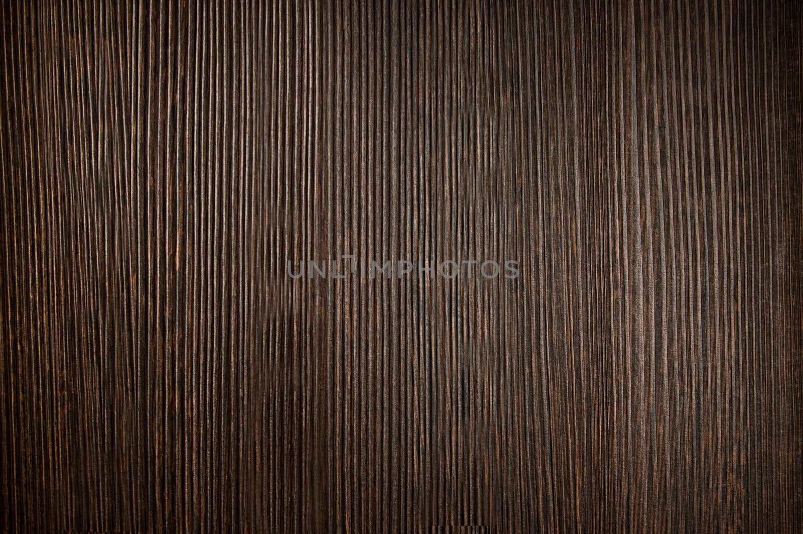 Dark brown laminate with rough textured surface imitation wood