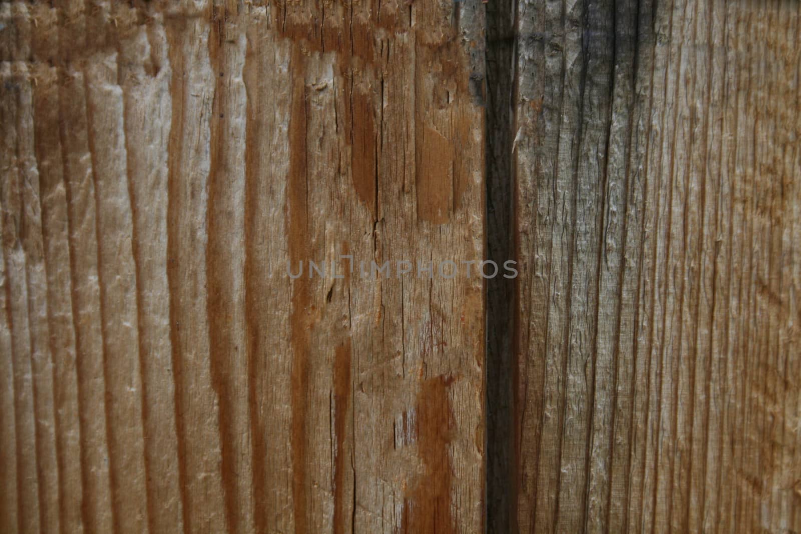 Old wooden surface with a crack in the middle