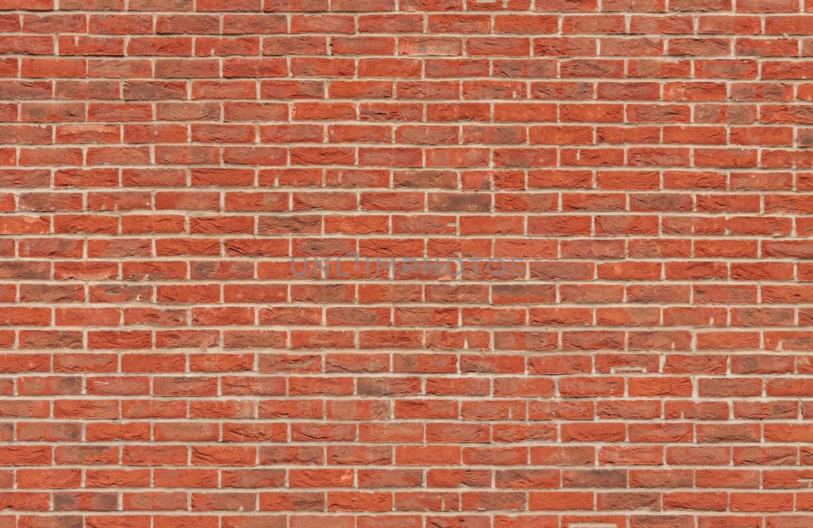 Laying a brick wall with red-hot bricks.Texture.Background.