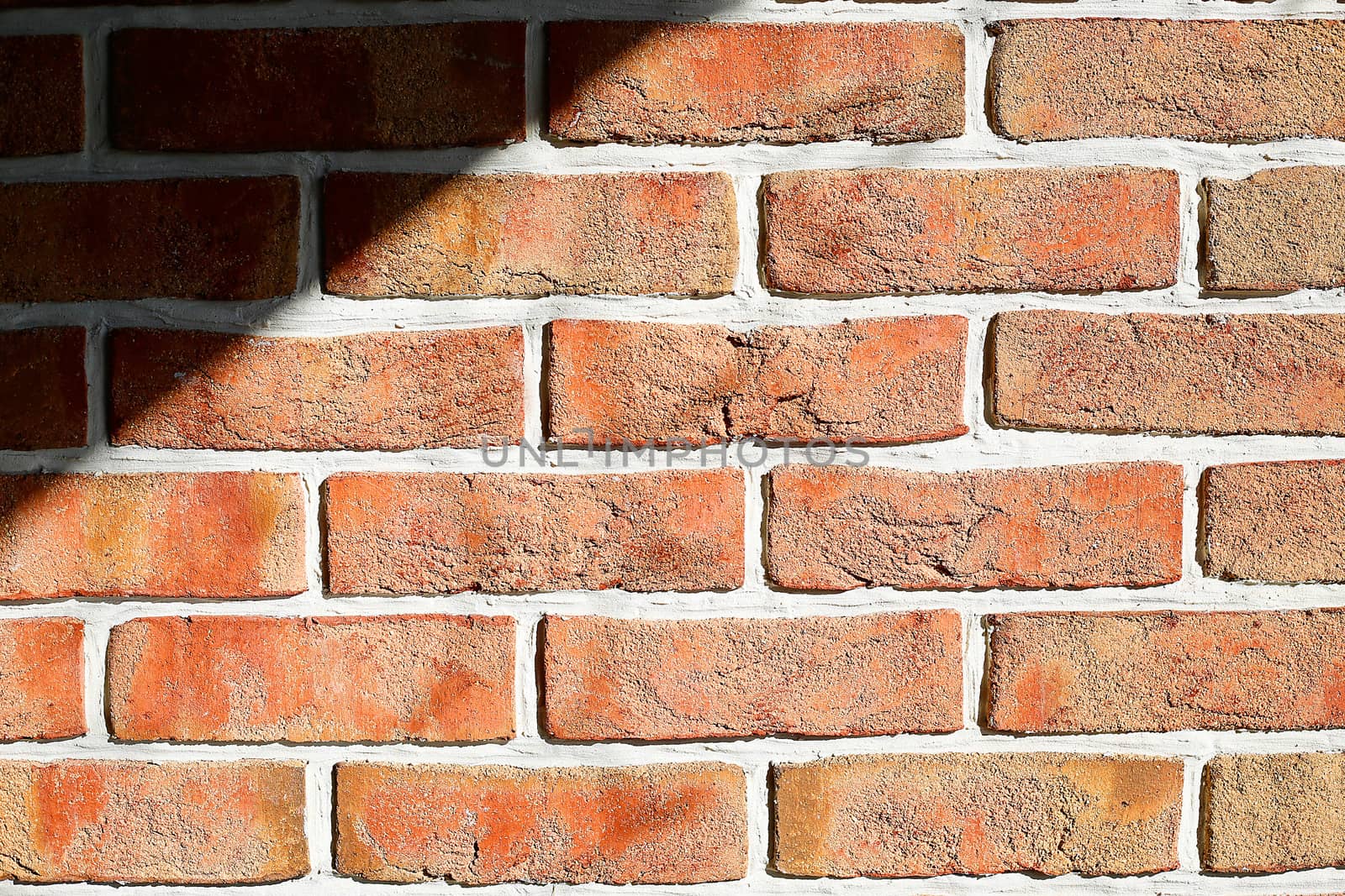 Brick wall of decorative brick orange.Texture.Background