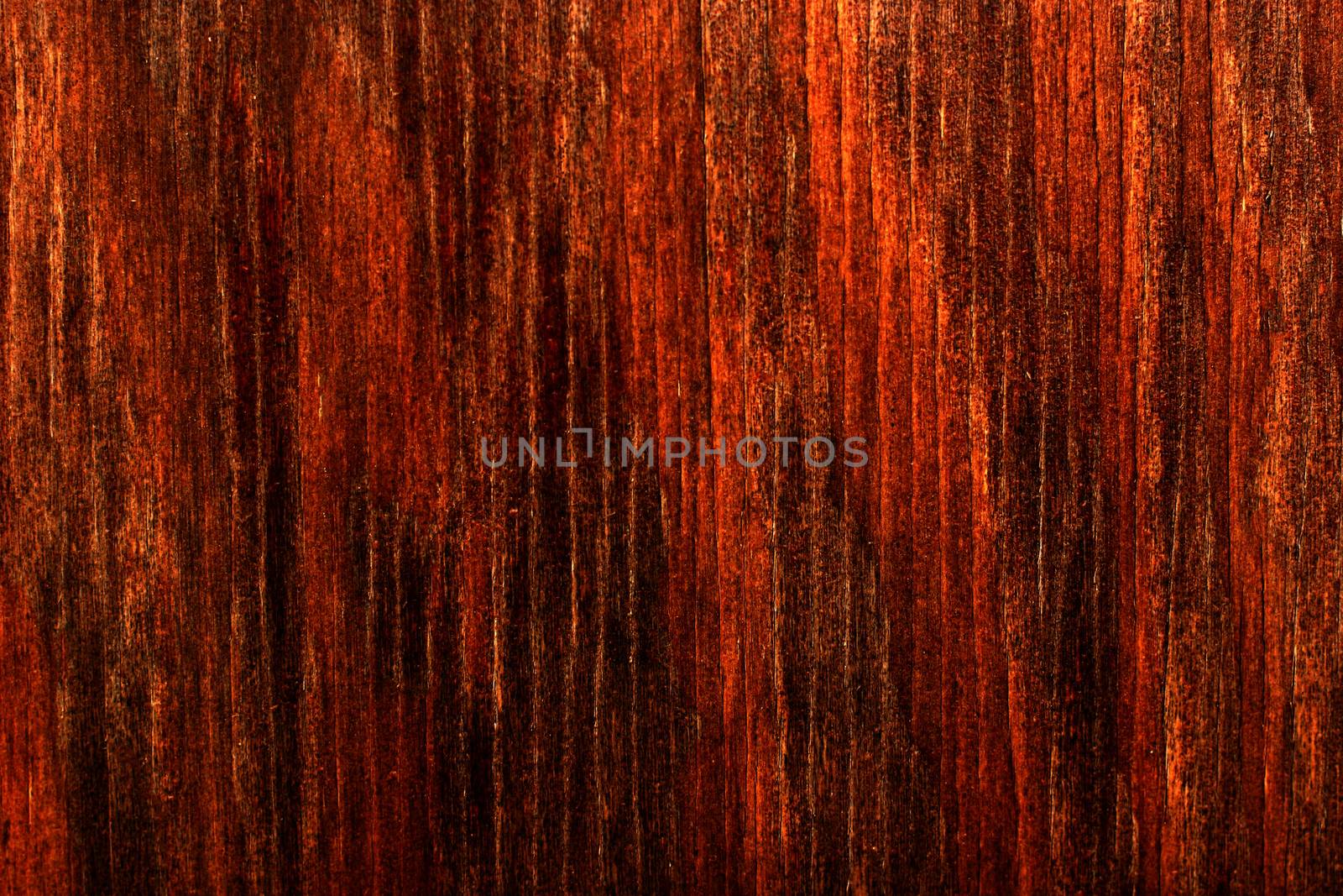 Laminate with imitation wood with a red tint.Texture.Background