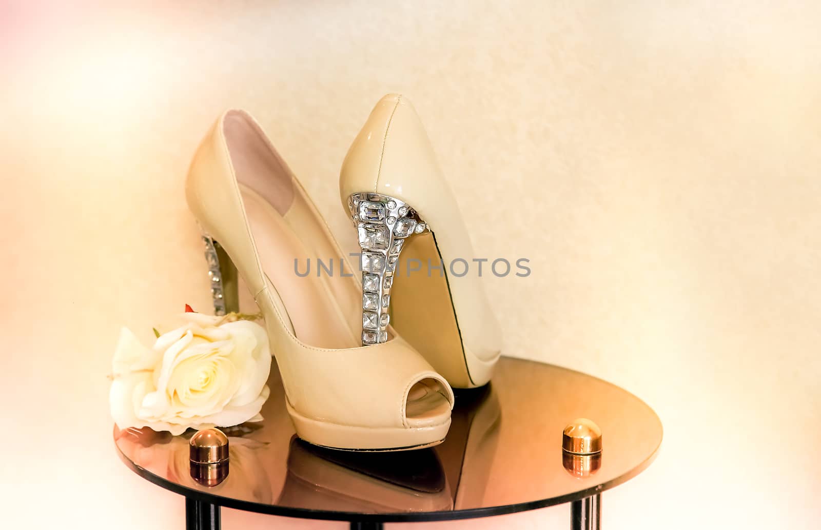 Wedding shoes with high heels decorated with precious stones