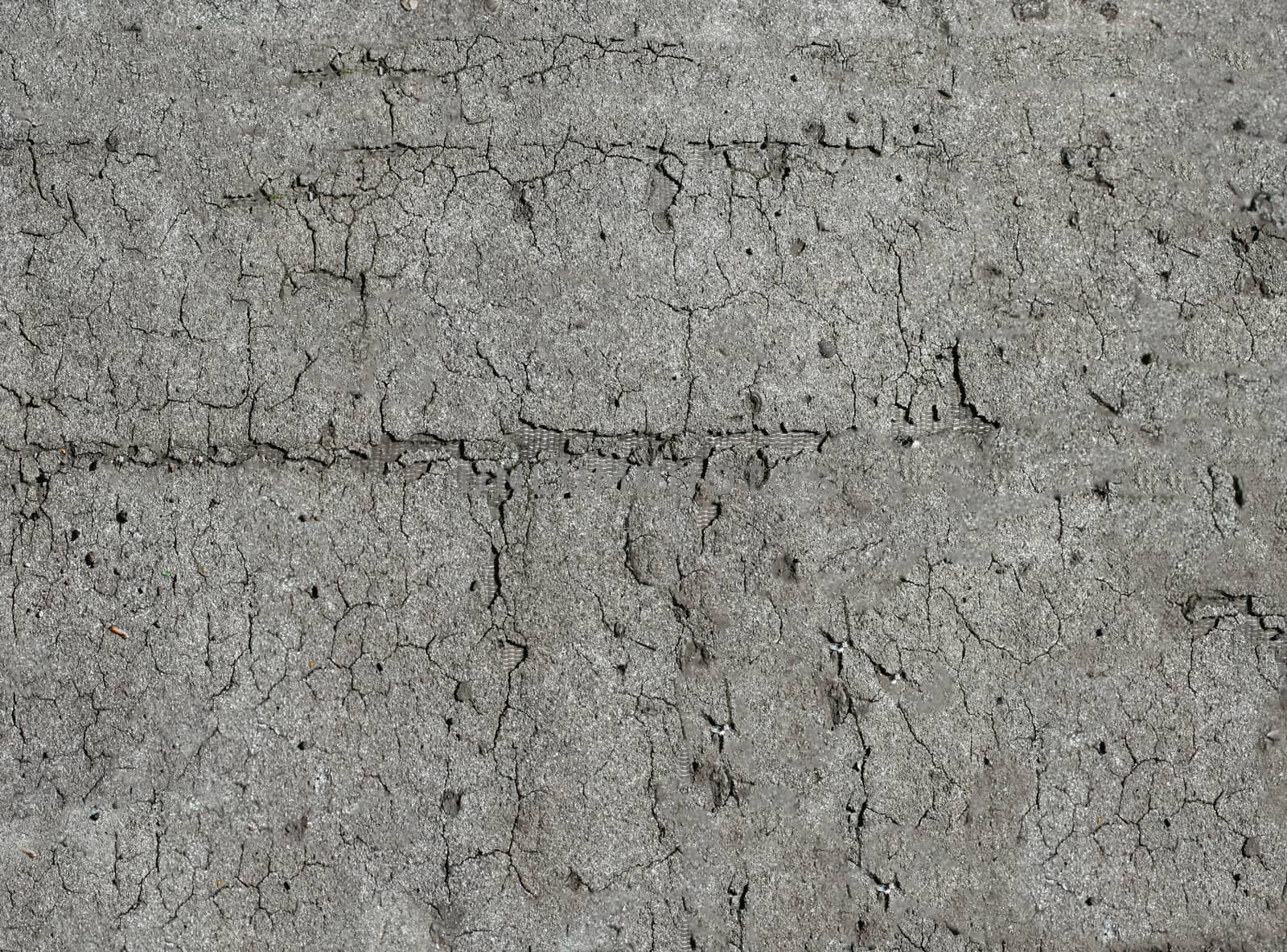 Damaged wall of an old house with peeling plaster