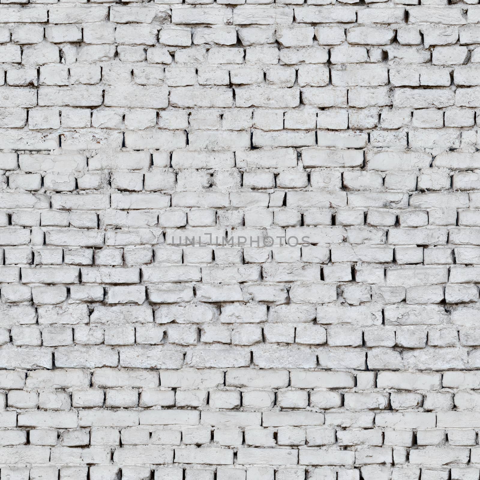 Aged brickwork of gray and white bricks .Texture or Background.