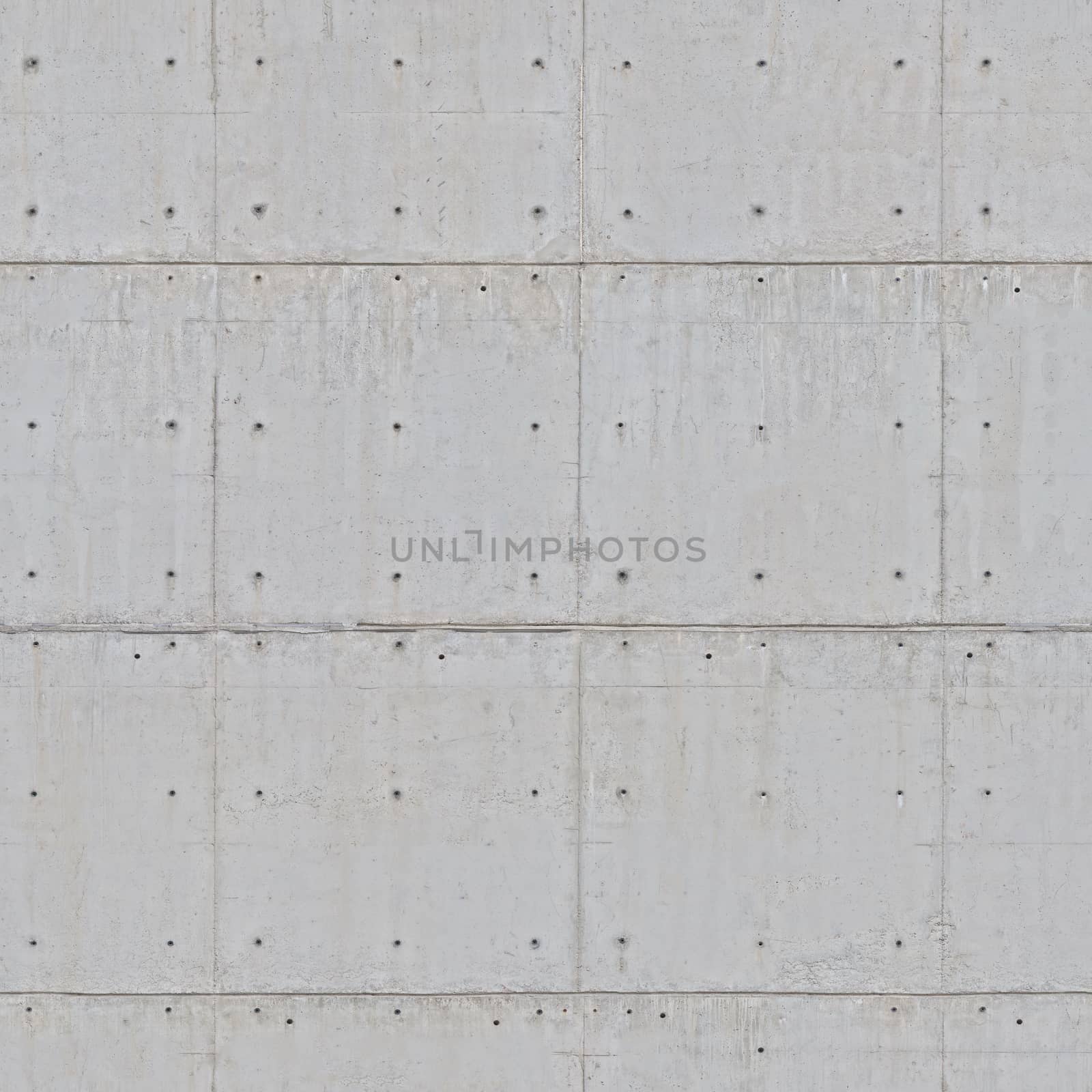 Concrete wall of gray color with small holes .Background or texture