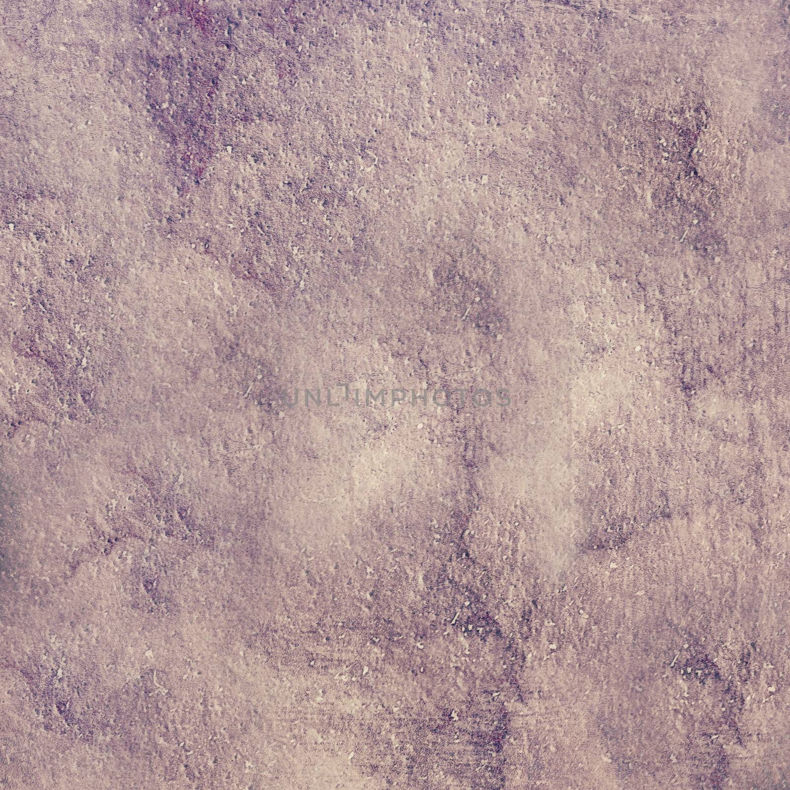 Rough uneven wall with a textured surface of purple color.Texture or background