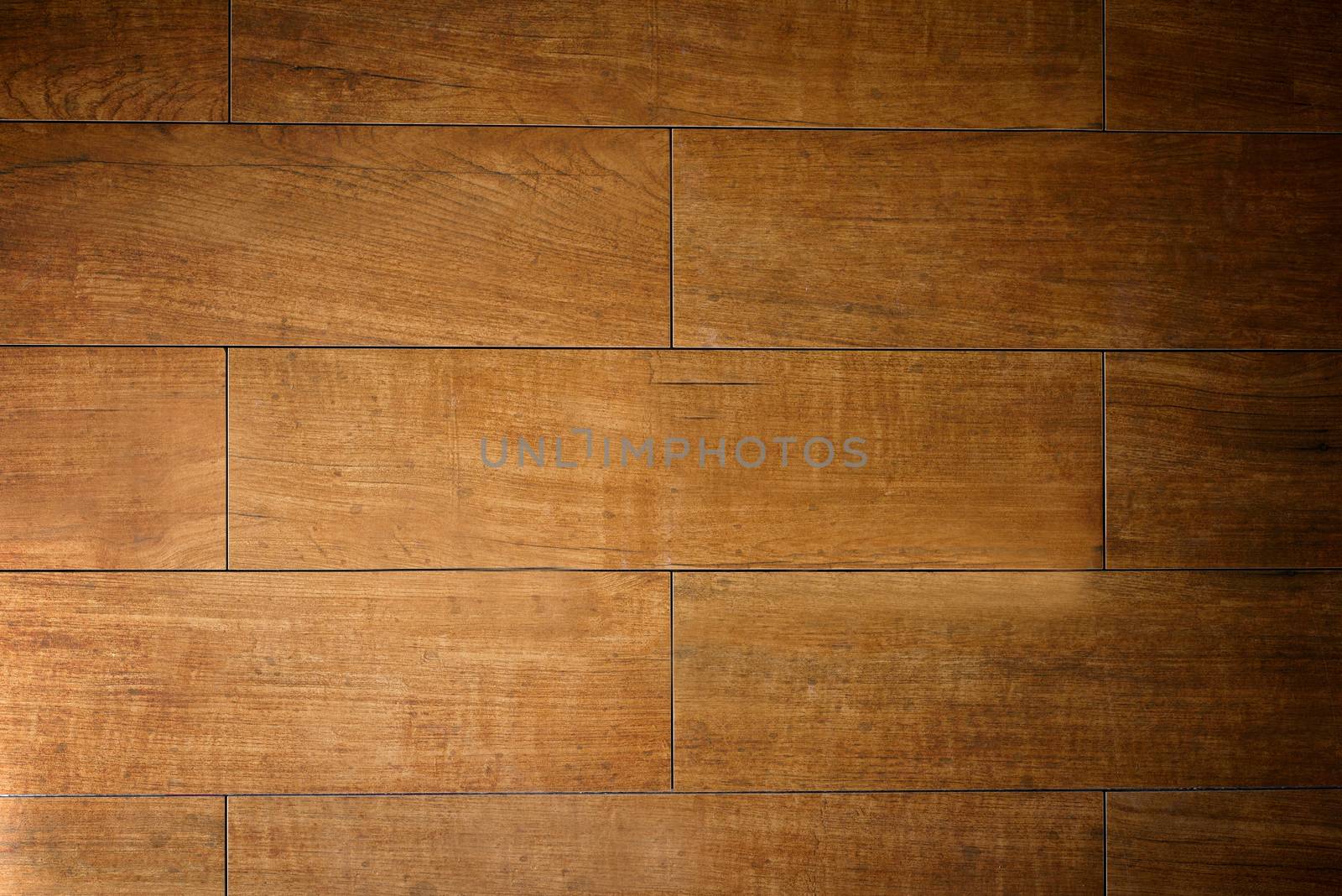 Laminate flooring with imitation parquet Board brown and textured surface .Texture or background