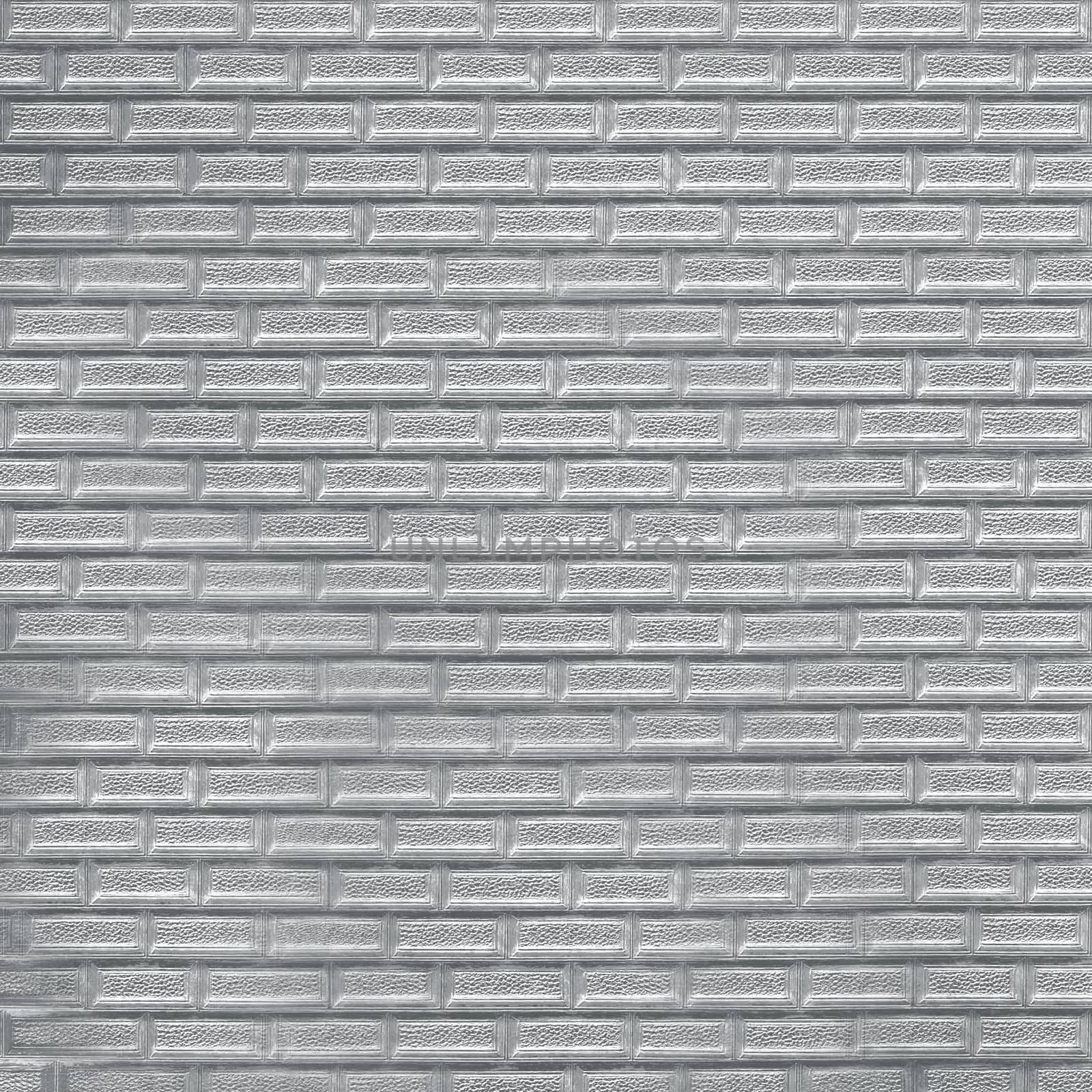 Paper with applied textured pattern in the form of small silver bricks.Texture or background