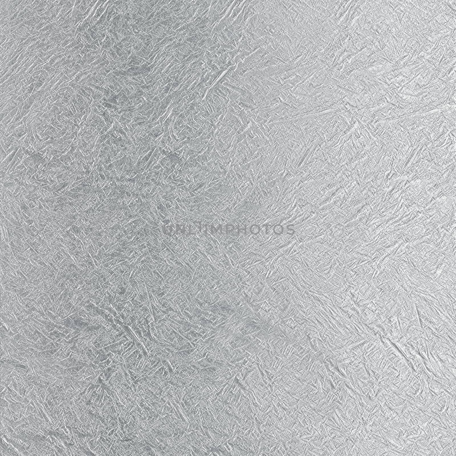 The surface with a pattern of silver color in the form of small embossing and scratches.Texture or background