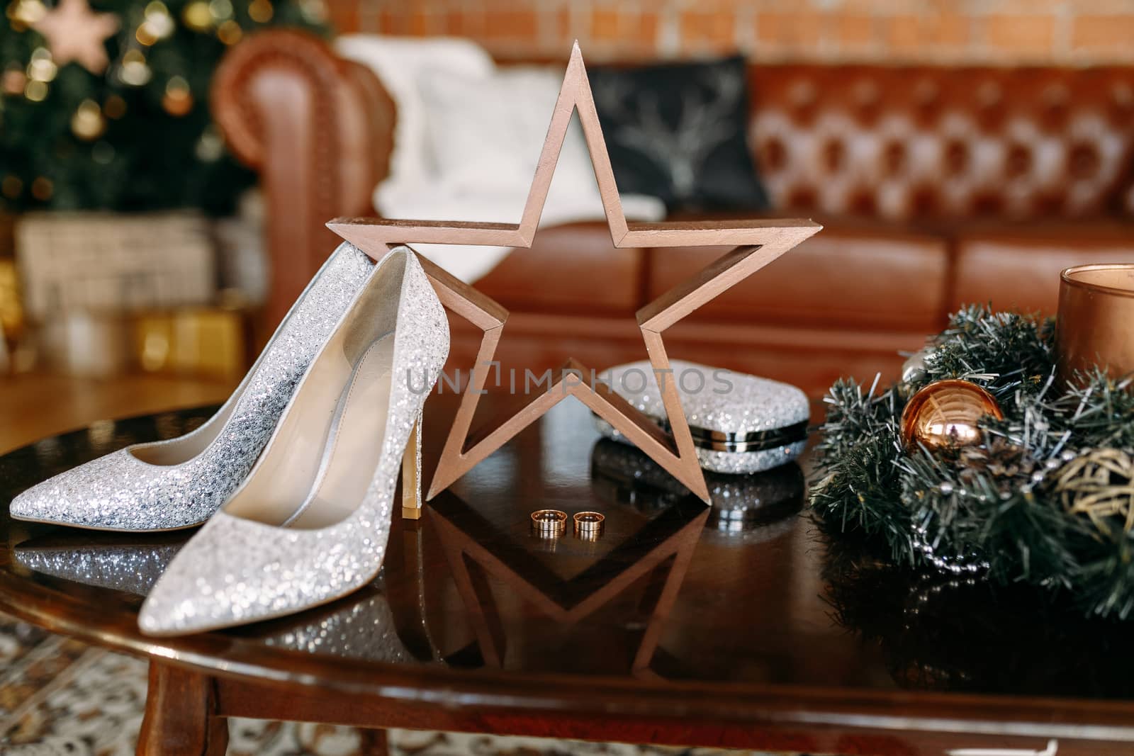 Wedding shoes and wedding paraphernalia, wedding gold rings, wedding bouquet on the table