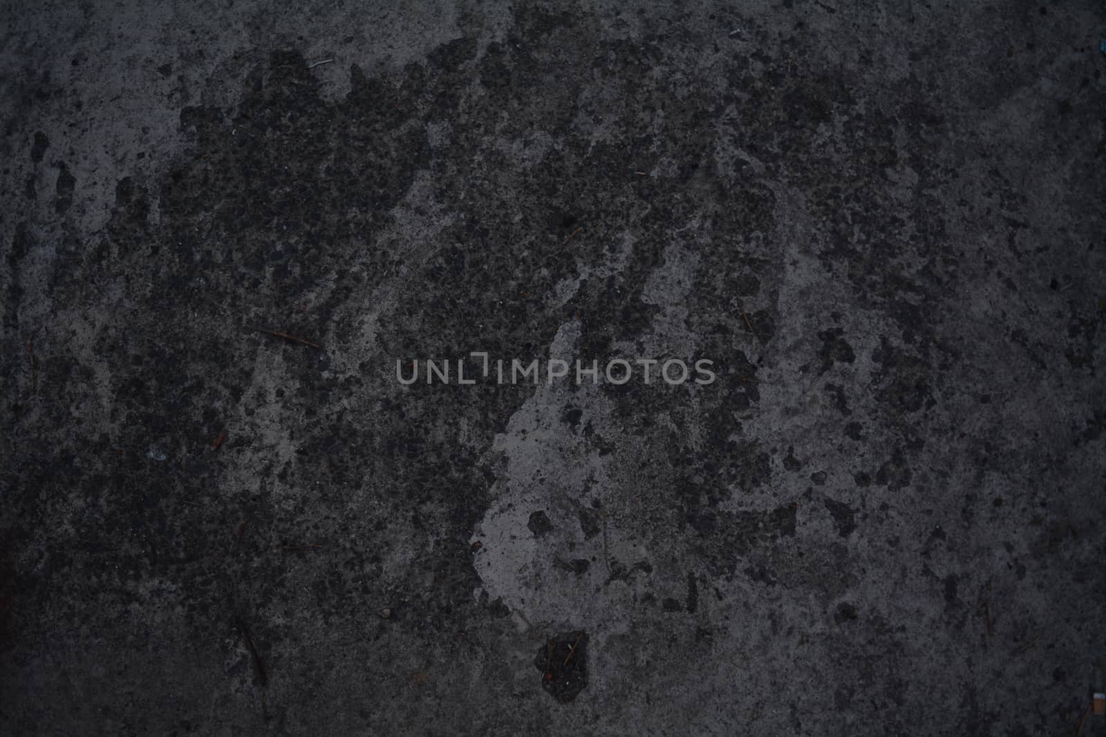 Abstract dark grey marble with a crack in the corner