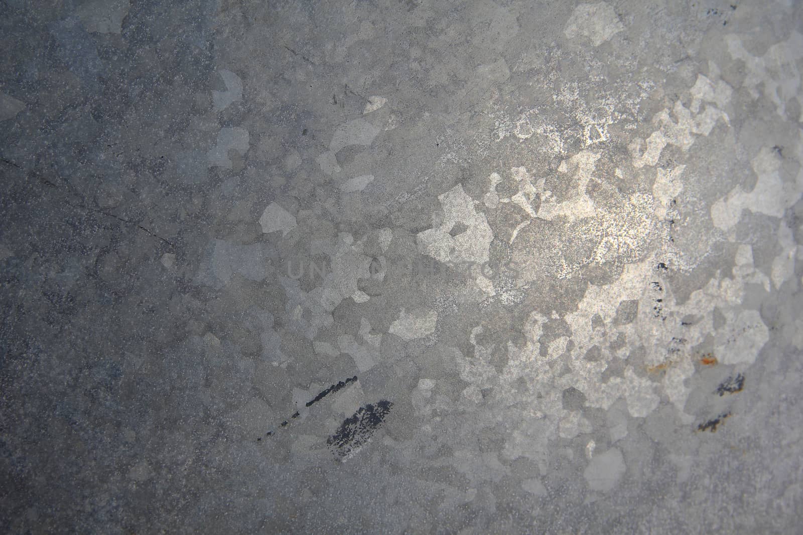 Abstract dark grey marble with a crack in the corner