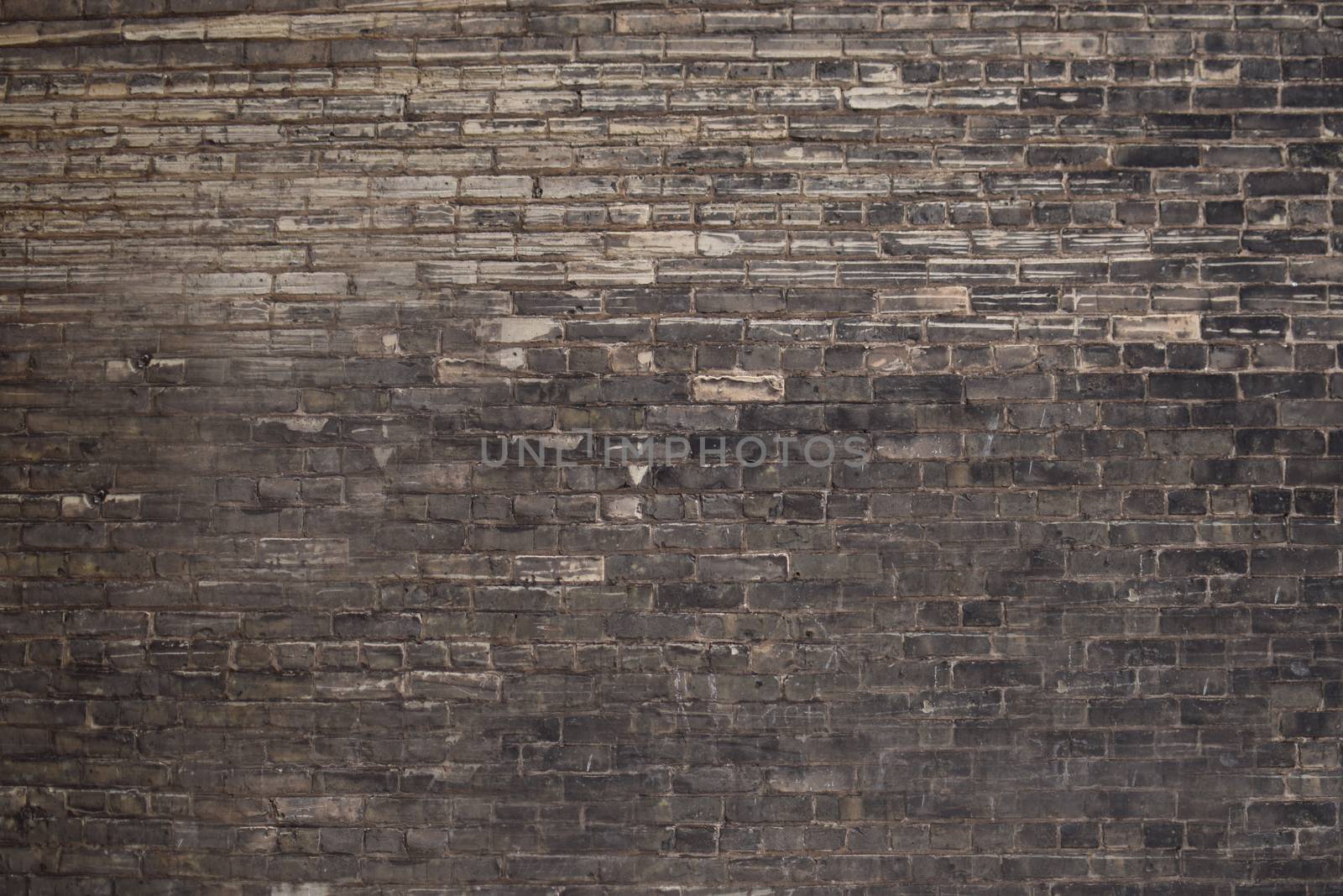 Brick wall texture with black and gray brick