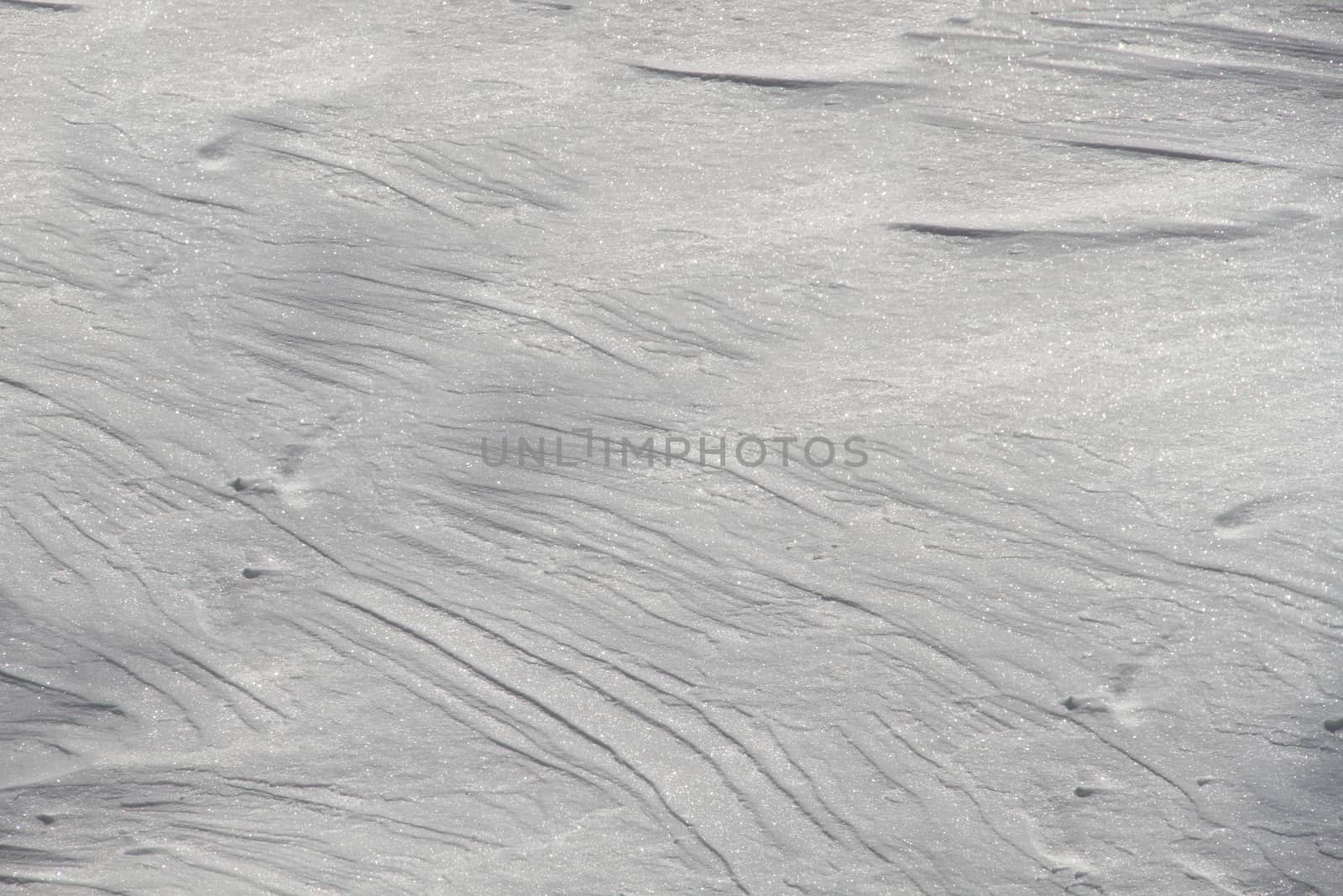 White snow in cold winter with crystallized surface